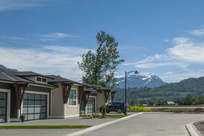 Rendering of Elysian Village homes & mountain view